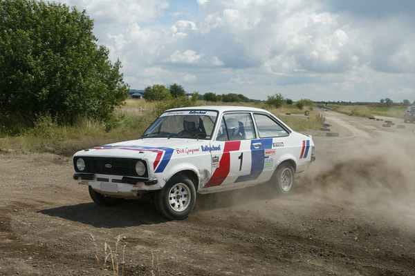 Rally car on dirt track